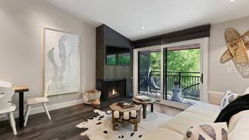 Condo (700 Monarch 302) | Living area | 40-inch flat-screen TV with cable channels
