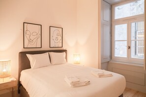 2 slaapkamers, een strijkplank/strijkijzer, gratis wifi, beddengoed