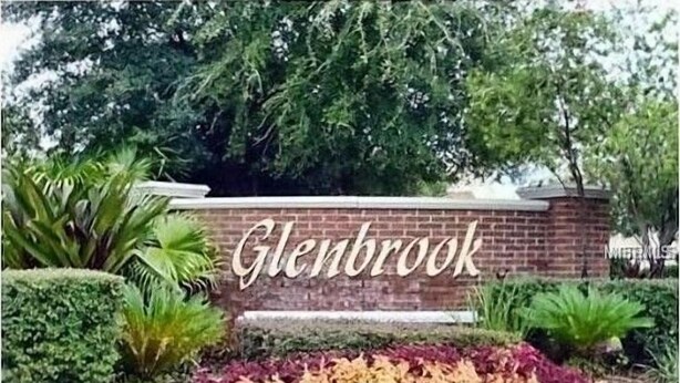 A brick wall with the name 'Glenbrook' in large letters. - Glenbrook Lovely 4 Bed Pool/Spa Home! (Clermont)