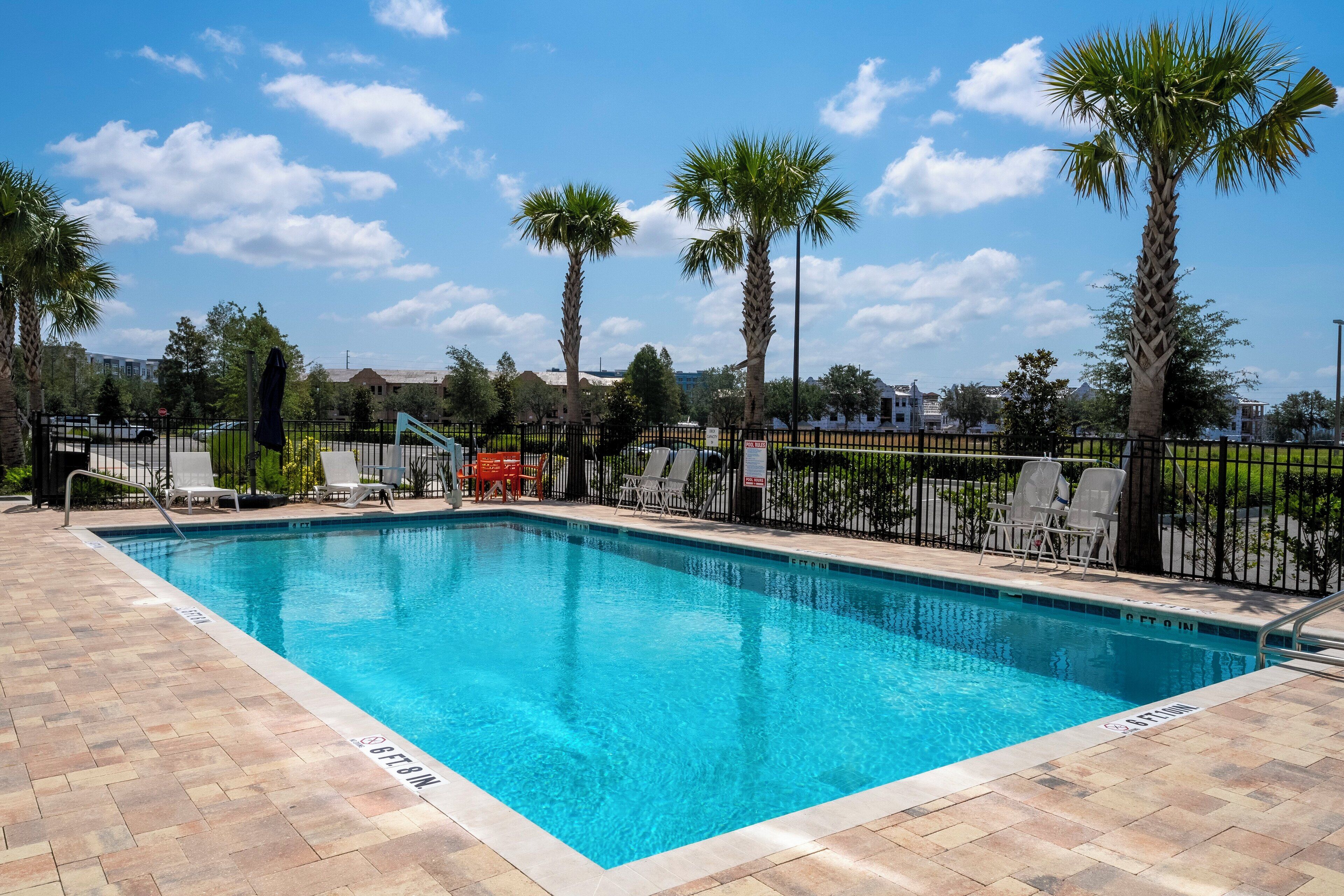 outdoor pool, pool umbrellas, pool loungers