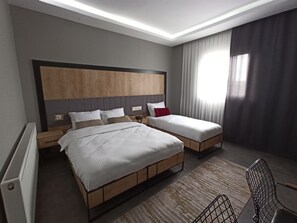 Ropa de cama de alta calidad y minibar 