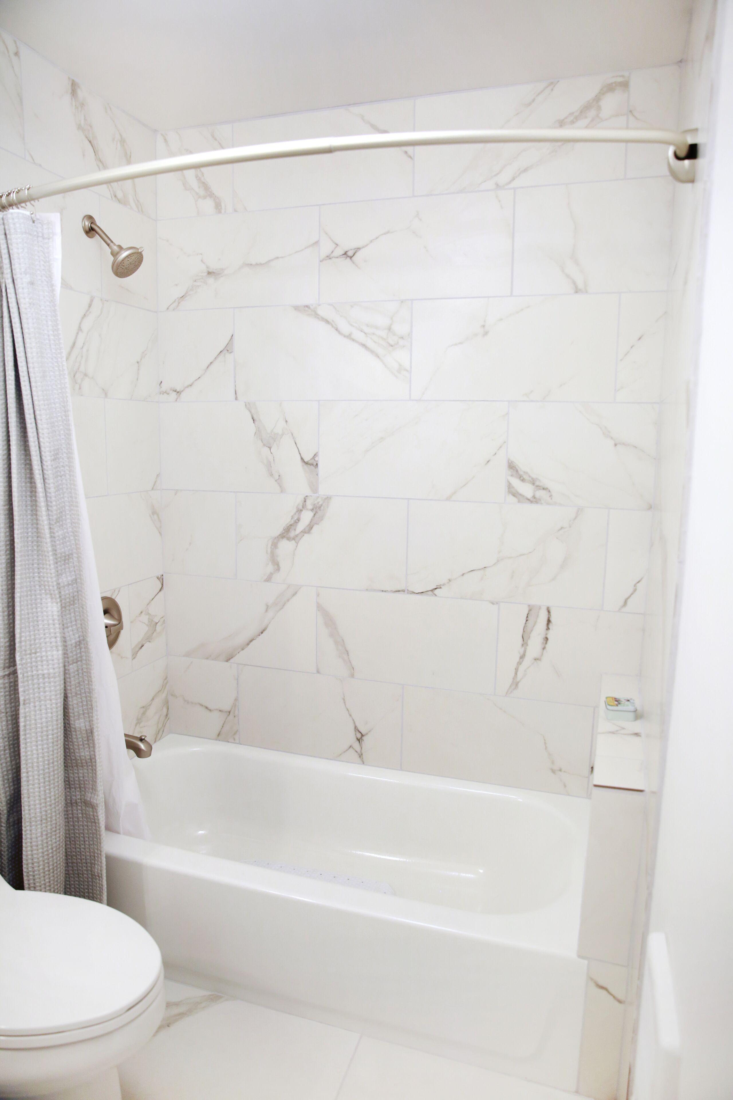 Combined shower/tub, hair dryer, towels, soap
