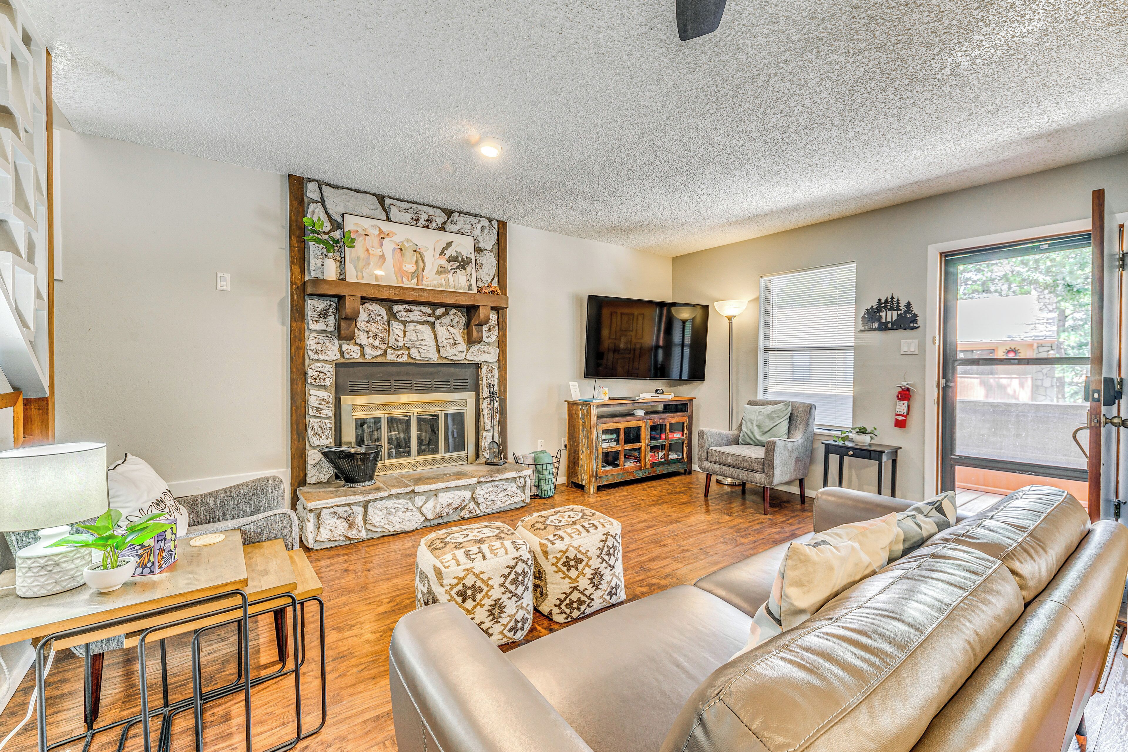 TV, fireplace, books