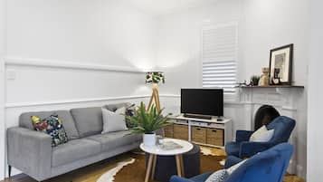 Cottage Confort | Coin séjour | TV connectée, Netflix, services de streaming