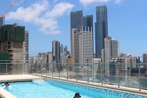 Outdoor pool, open 8:00 AM to 10:00 PM, pool loungers