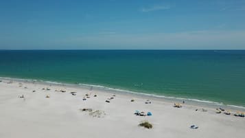 On the beach, beach towels, motor boating