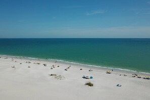 On the beach, beach towels, motor boating