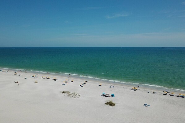 On the beach, beach towels, motor boating