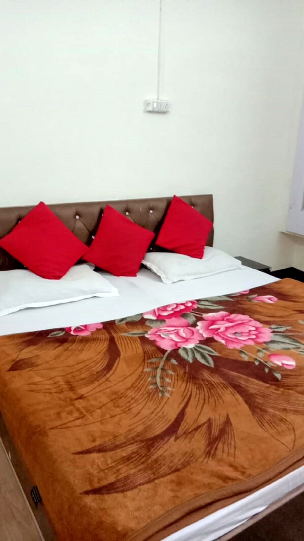 Egyptian cotton sheets, premium bedding, down duvets, memory-foam beds