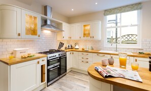 Cottage | Private kitchen | Fridge, dishwasher, highchair, cookware/dishes/utensils - Brandelhow House (Keswick)