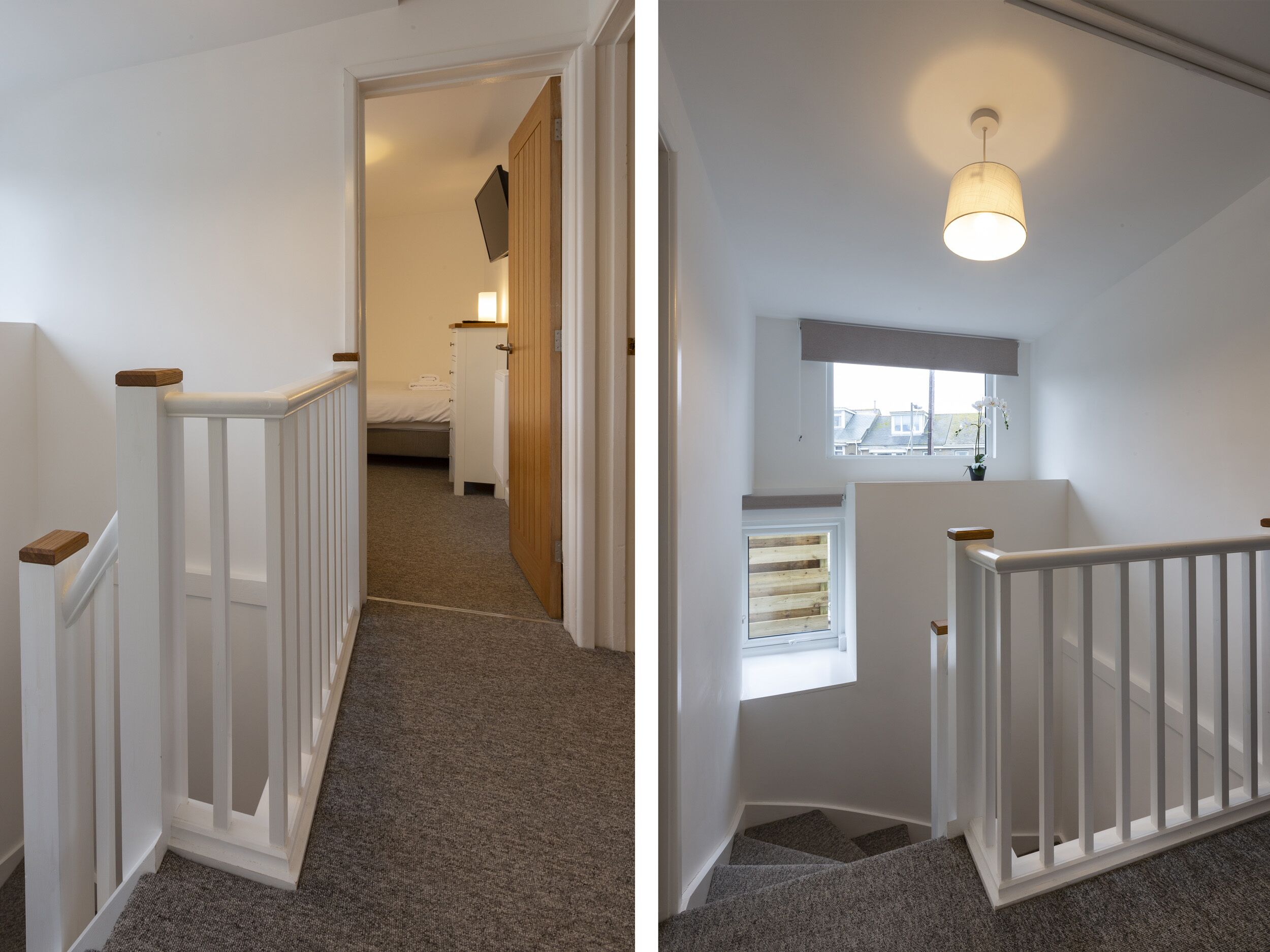 A staircase with white railings and carpeted steps.