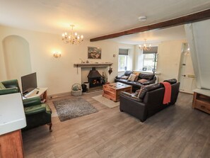 Cottage | Woonruimte | Een dvd-speler