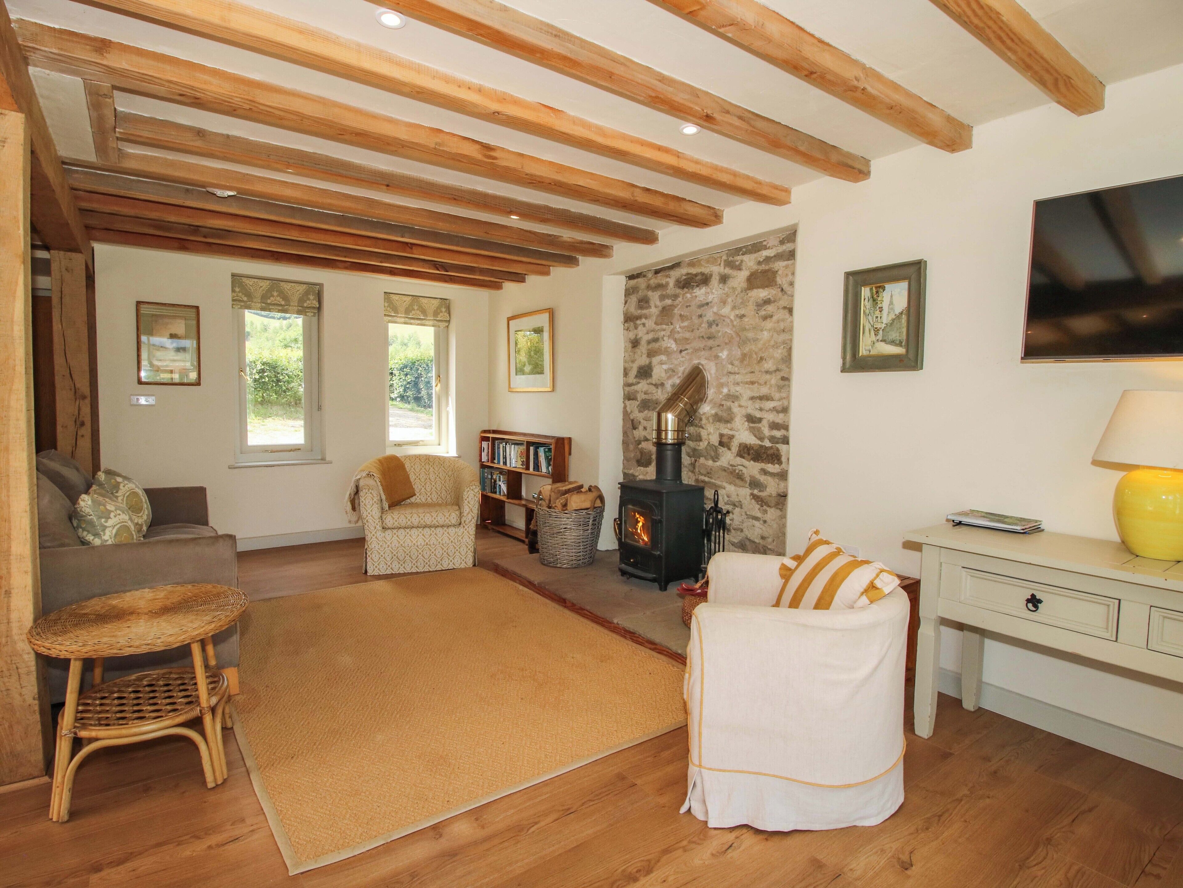 Cottage | Woonruimte | Een open haard