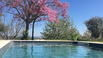 Outdoor pool, a heated pool, pool loungers