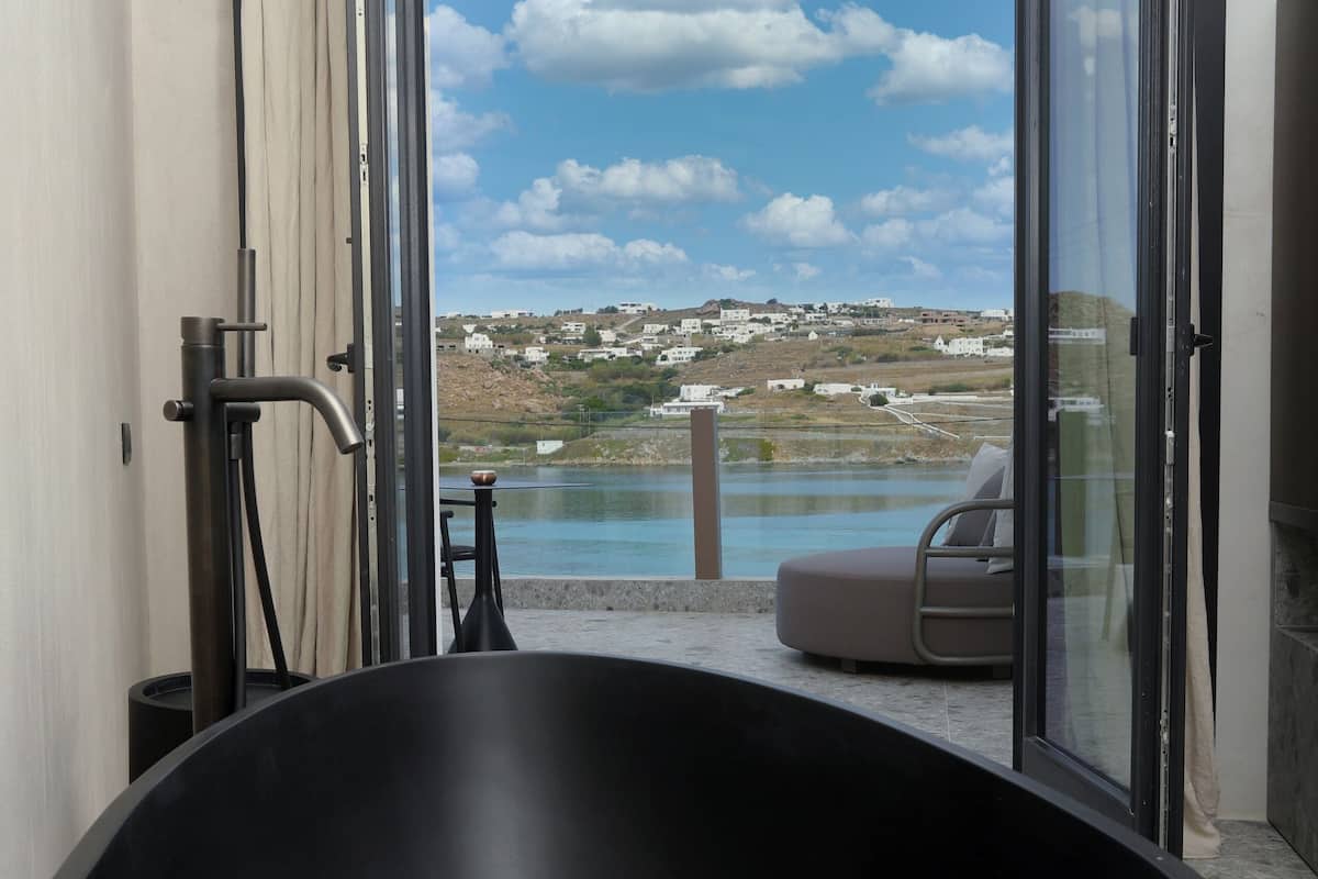 eternal suite with plunge pool and sea view | bathroom | designer toiletries, hair dryer, bathrobes, slippers