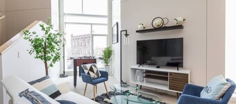 Upscale 3BR Penthouse by CozySuites