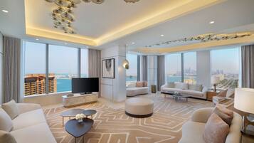 Presidential Suite, 1 King Bed | Living room | 52-inch Smart TV with satellite channels, TV, iPod dock