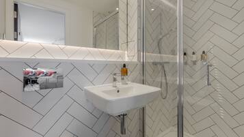 Classic Studio | Bathroom | Shower, hair dryer, towels, soap