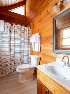 Bathtub, hair dryer, towels