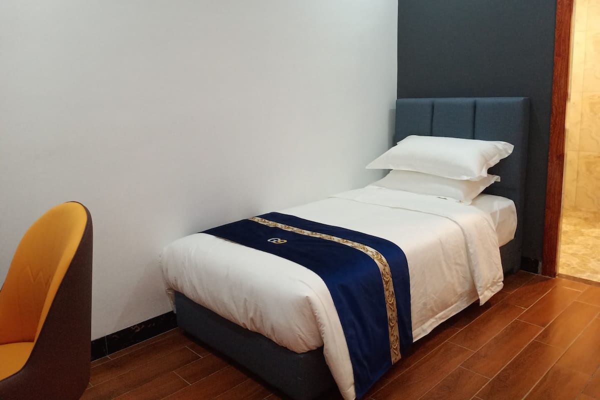 Superior Single Room (No Window) | Desk, laptop workspace, blackout curtains, iron/ironing board