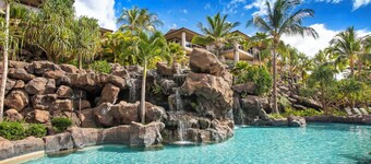 Indulge in Maui luxury: private lanai, gourmet kitchen, waterfall pool & jacuzzi