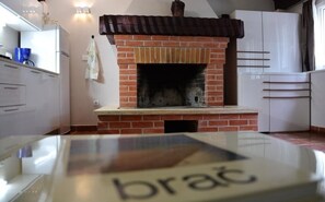 Fridge, stovetop, dining tables