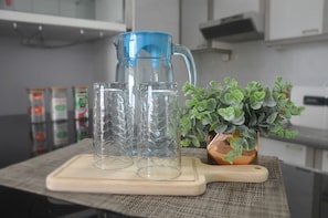 Fridge, electric kettle, cookware/dishes/utensils