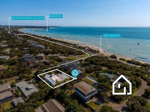 On the beach, sun-loungers