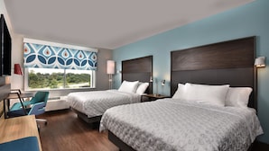 A hotel room with two beds, a desk, and a chair. - Tru by Hilton Beckley (Beckley)