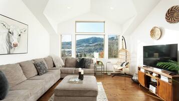 House (Lemond Place Home) | Living room | 55-inch flat-screen TV with satellite channels, TV