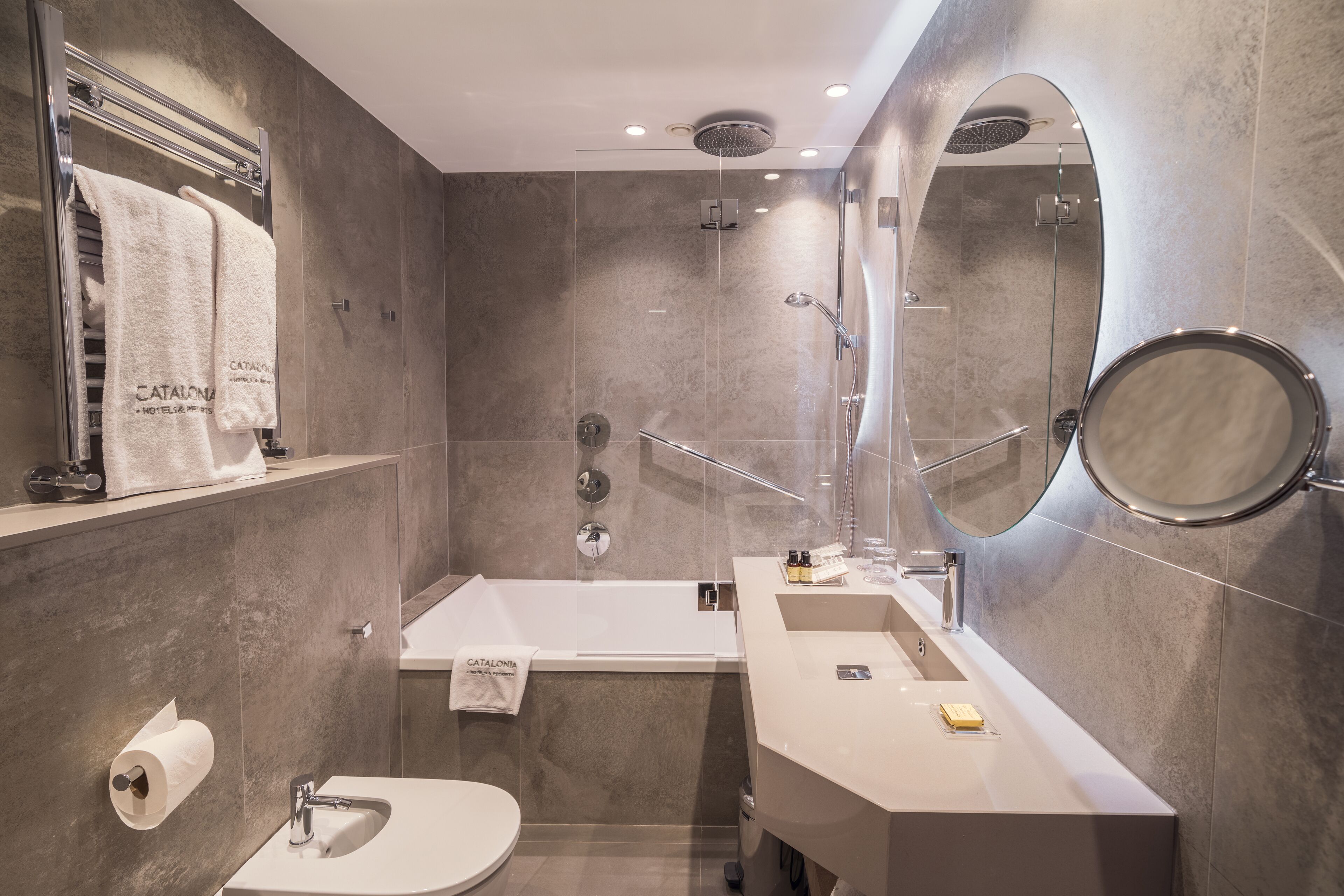 eco-friendly toiletries, slippers, bidet, towels