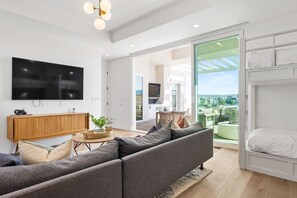 House, Multiple Bedrooms | Living area | 50-inch Smart TV with cable channels, TV, streaming services - The Beach Front by RedAwning (St. George)