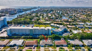 Situated in a lush, residential area, this hotel offers stunning views of a nearby body of water.