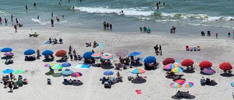 On the beach, sun loungers