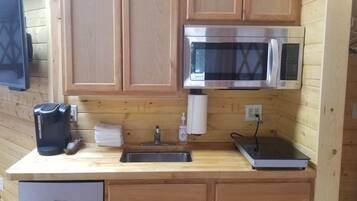 Fridge, microwave, stovetop, coffee/tea maker