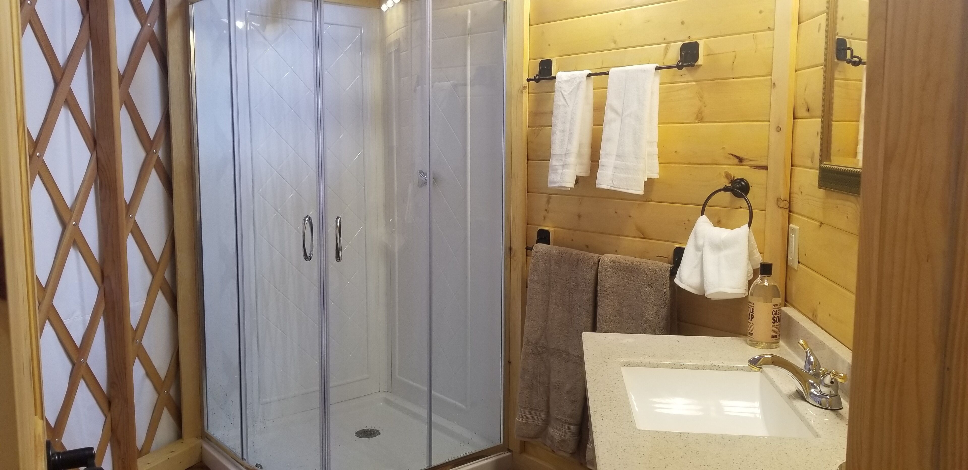 Shower, towels, soap, toilet paper