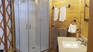 Shower, towels, soap, toilet paper