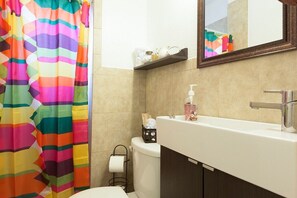 Shower, hair dryer, towels, soap