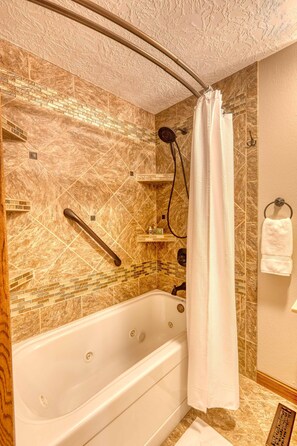 Combined shower/tub, jetted tub, hair dryer, towels