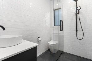 Shower, hair dryer, towels, soap