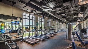 A gym with treadmills, weight machines, and exercise balls. - New Listing! Solara Resort, 8mi to Disney & 15mi to Universal - GRH438809 (Kissimmee)