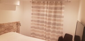 2 dormitorios, tabla de planchar con plancha, wifi y ropa de cama