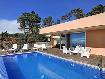 Secluded Prazeres villa, embraced by nature, infinity pool, and captivating ocean vistas – a tranquil paradise in Madeira. #villa #oceanview #pool #nature