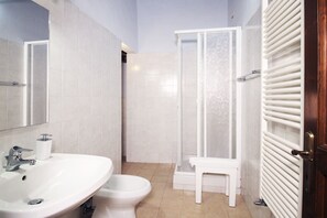 Shower, hair dryer, bidet, toilet paper
