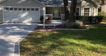 RENT THIS LOVELY SPACIOUS HOME IN THE VILLAGES SURROUNDED BY LOTS OF TREES