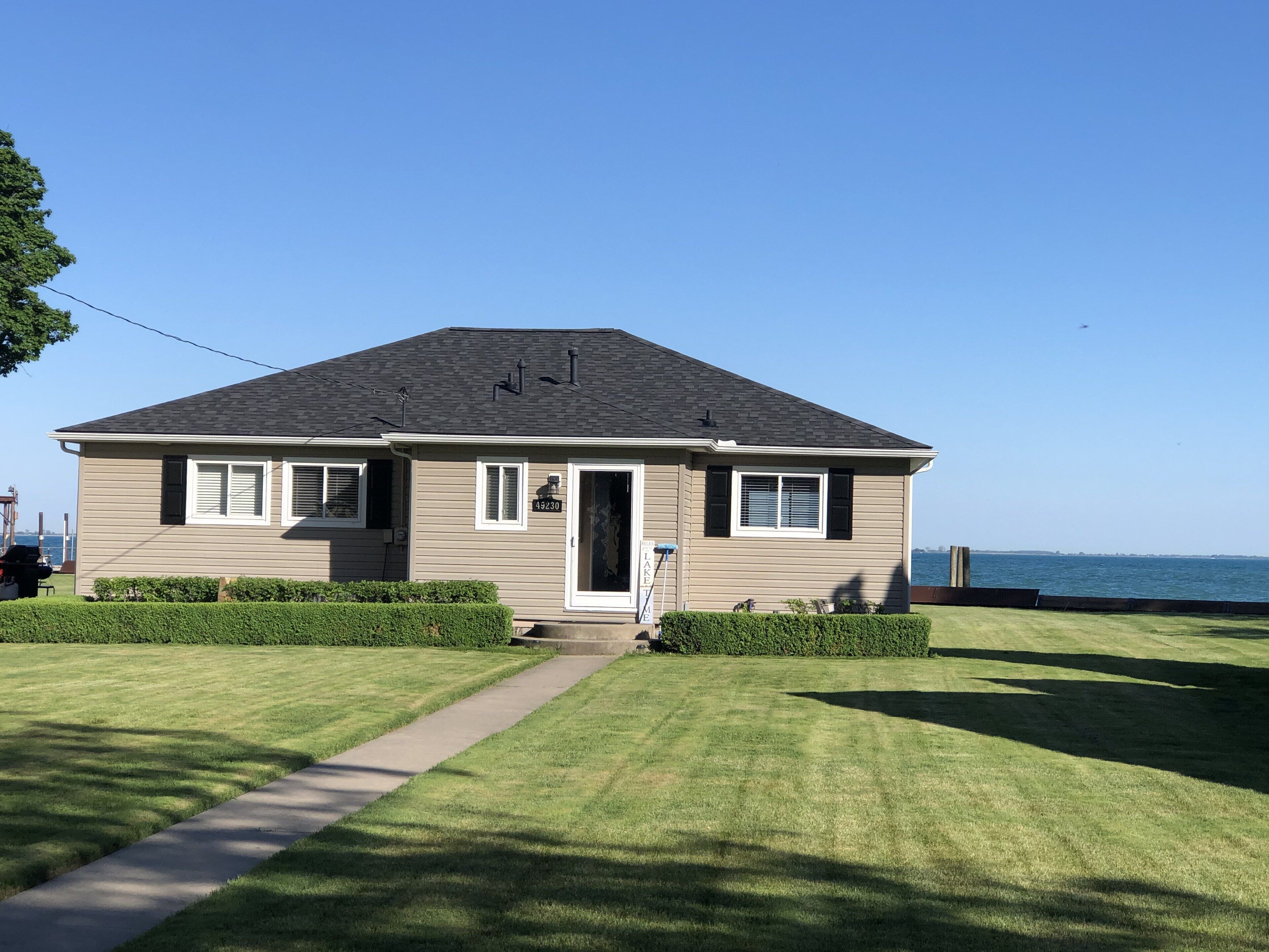 Adorable 4 bedroom lakefront home with dock on a quiet street