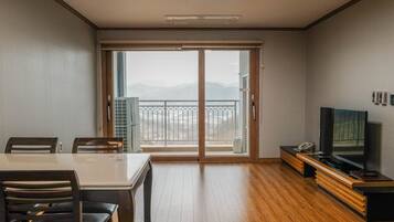 Room (Condo Type) | Living area | Flat-screen TV, heated floors