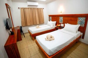 Wi-Fi de cortesia, roupa de cama