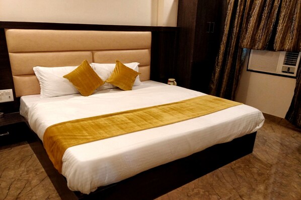 Egyptian cotton sheets, premium bedding, down duvets, memory-foam beds