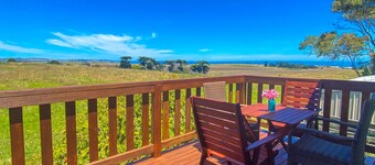 Spectacular ocean, mountain and farm views at Karinya Beach House